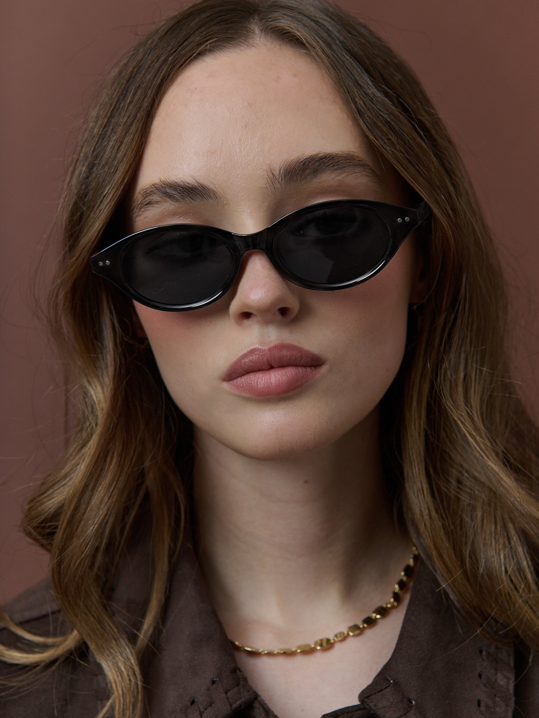 Aire Sleek Oval Sunglasses